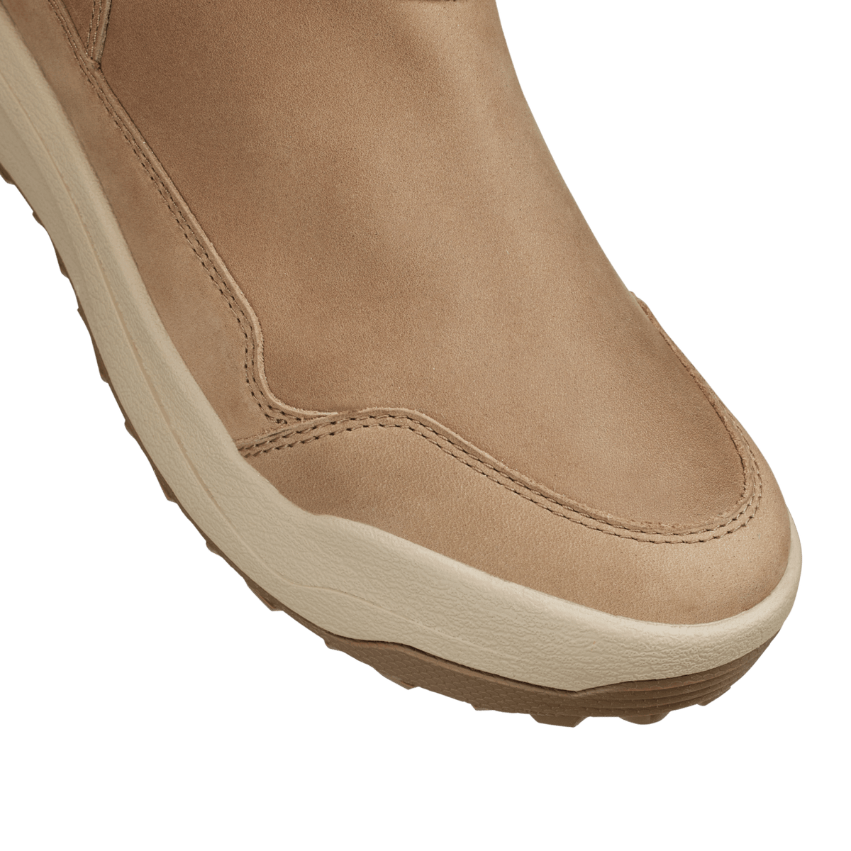 Tan leather boot front with stitched vamp and thick cream midsole