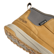Amber suede ankle boot with gray lining panel, stitched overlays, chunky sole