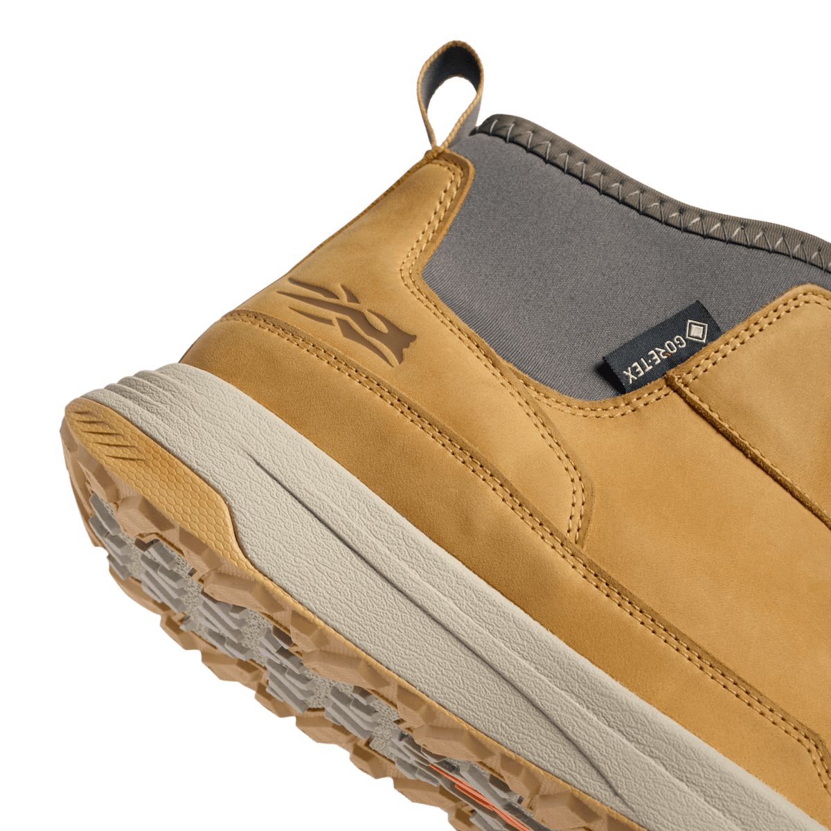 Amber suede ankle boot with gray lining panel, stitched overlays, chunky sole