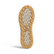 Boot outsole view with rugged tread pattern and light rubber edges
