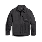 Black chore coat front view with button-front closure and flap chest pockets.