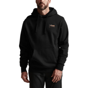 Black pullover hoodie on model, hood with drawstring and front pouch pocket