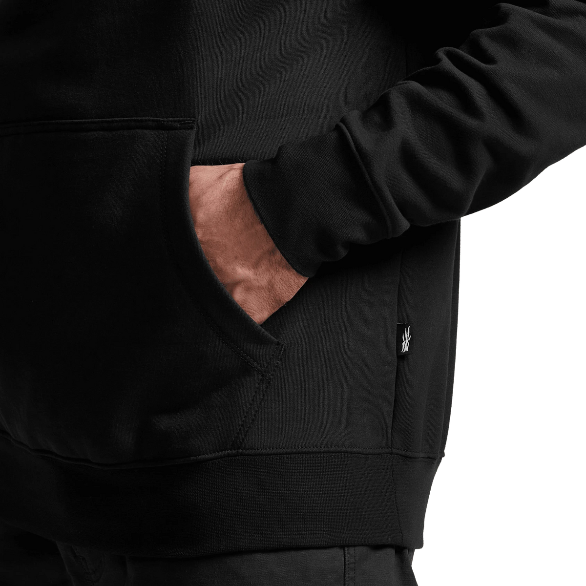Dark pullover hoodie close-up with kangaroo pocket and drawstring hood
