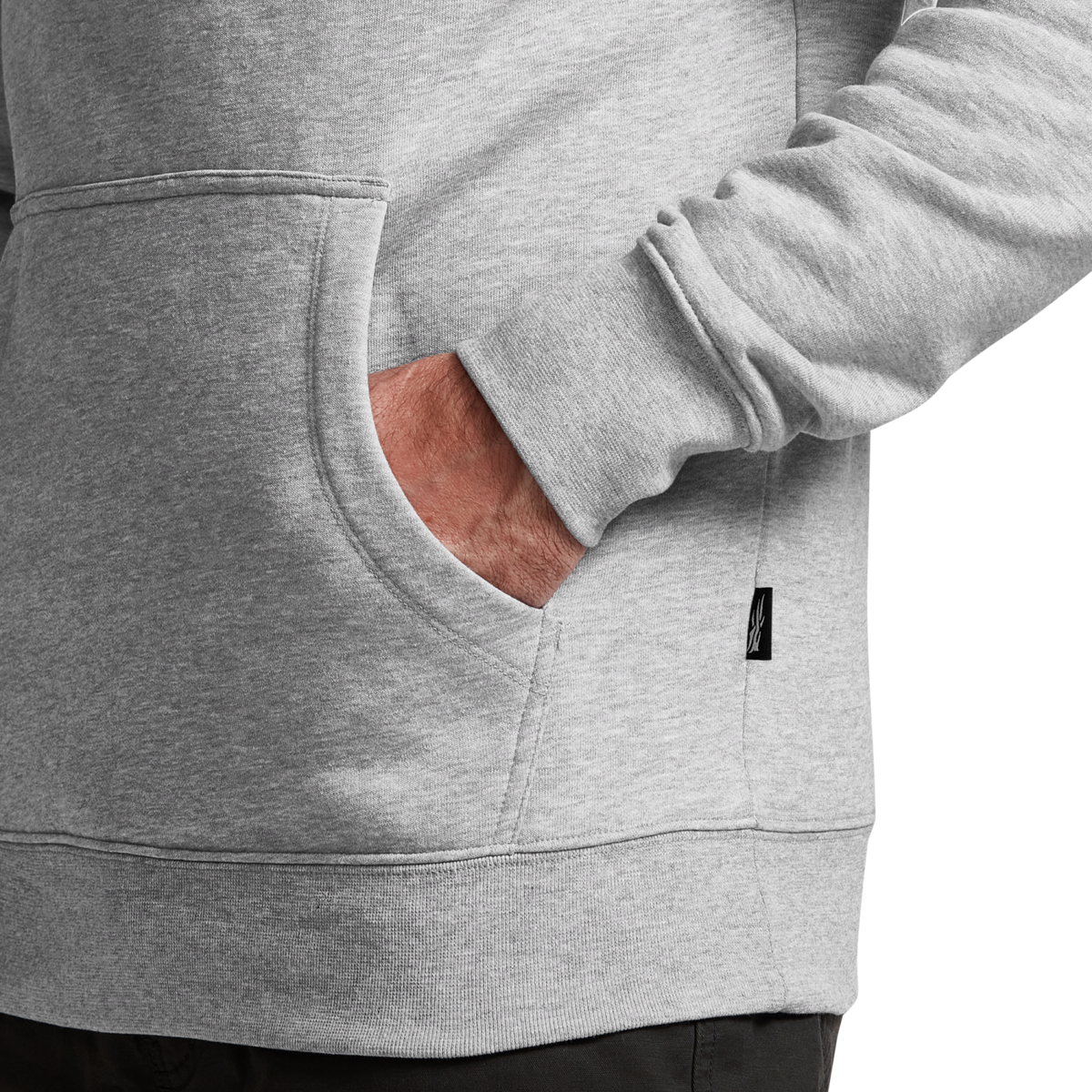 Heather gray hoodie close-up of front pouch pocket and sleeve hem