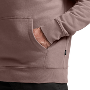 Taupe hoodie close-up of kangaroo pocket and sleeve; drawcord ends, Sitka branding