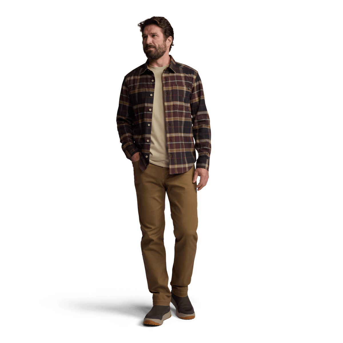 Men's plaid flannel button-up shirt worn casually with long sleeves and chest pocket