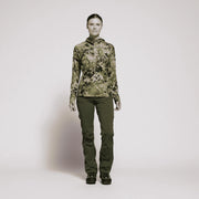 Women’s Ascent pant in deep olive green with cargo pockets and relaxed straight leg