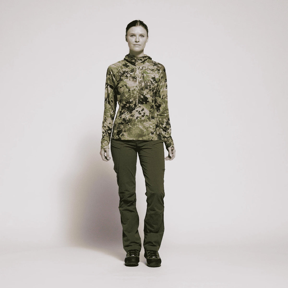 Women’s Ascent pant in deep olive green with cargo pockets and relaxed straight leg