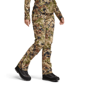 Camouflage ascent pants worn with trail shoes, full-length leg coverage