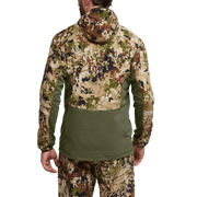 Back view of camo-printed hoodie with olive contrast pocket panel and hood