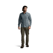 Mens Bluestone blue long-sleeve button-up shirt, standing full-body view with chest pocket