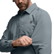 Men's long-sleeve shirt in bluestone blue, close-up of chest pocket and collar