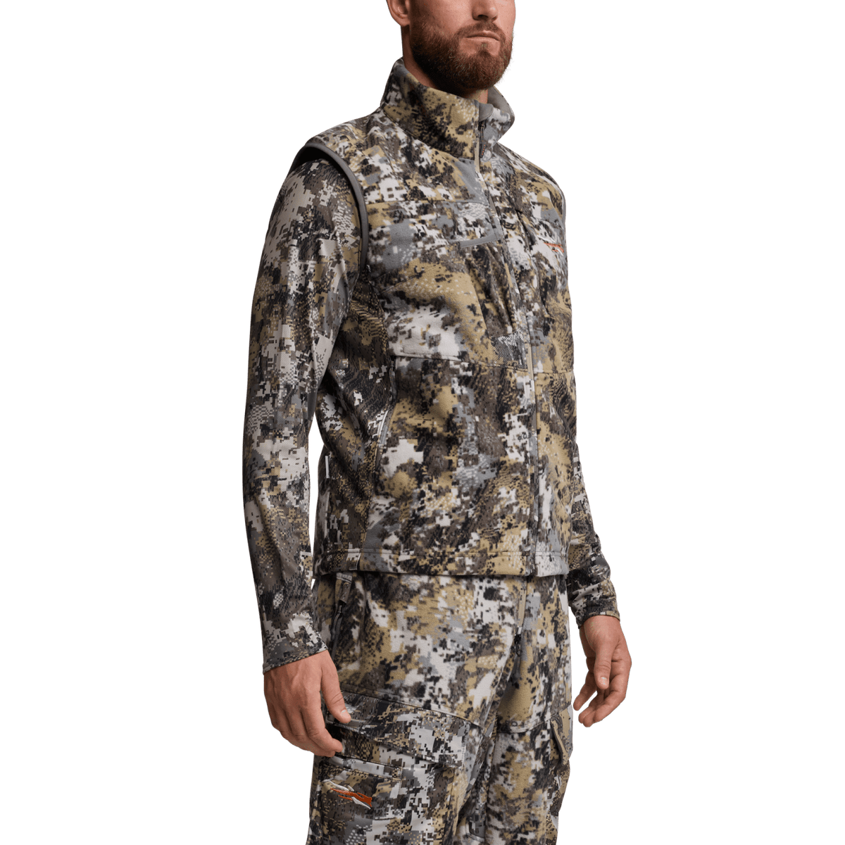 Camouflage vest with high collar and full-zip front over long-sleeve base layer