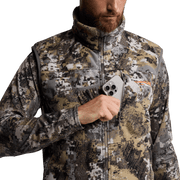 Stratus Vest 2.0 camouflage full-zip vest close-up with stand collar and chest logo patch