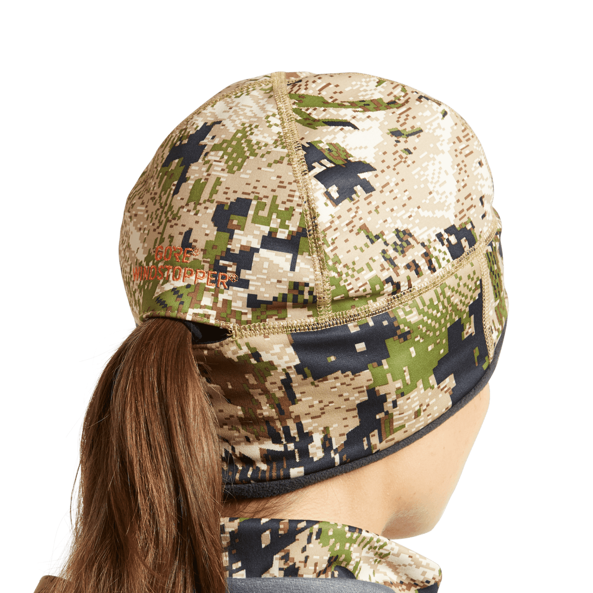 Women’s camouflage beanie with brown, tan, and green pixel pattern and black cuff