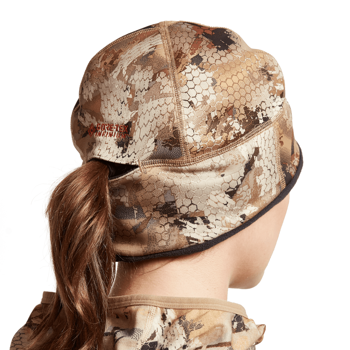 Women’s camouflage beanie viewed from back, brown and tan animal-print with black cuff