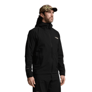 Black hooded jacket with zip-front and chest pocket, side view on model