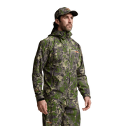 Green and gray camouflage Dew Point jacket with hood and full front zipper.