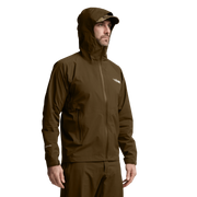 Solid tan hooded jacket worn on model, front zipper and side pockets