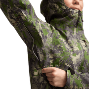 Camouflage jacket sleeve close-up with front zipper and elastic cuff