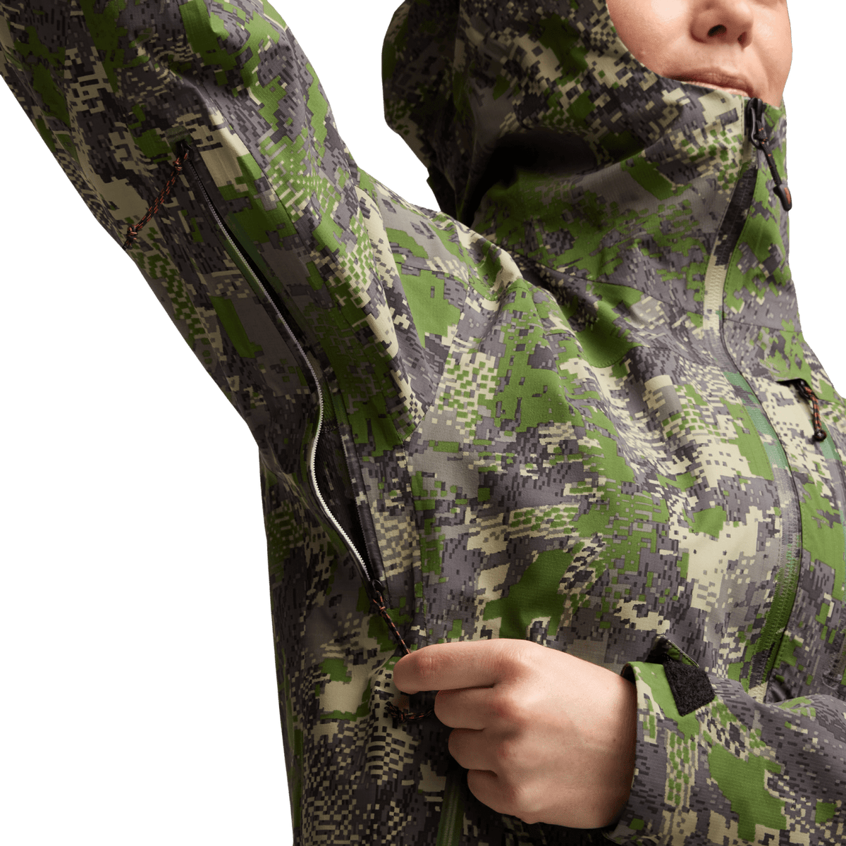 Camouflage jacket sleeve close-up with front zipper and elastic cuff