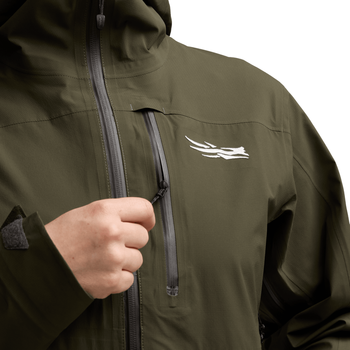 Women’s green rain jacket with front zipper and chest logo detail