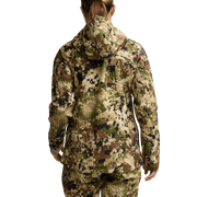 Women’s camouflage hooded jacket worn with back facing, showing hood and seams