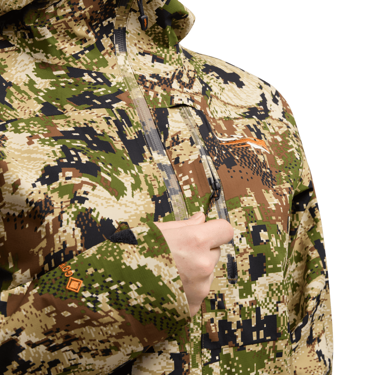 Camouflage jacket close-up with front zipper pull and logo patch