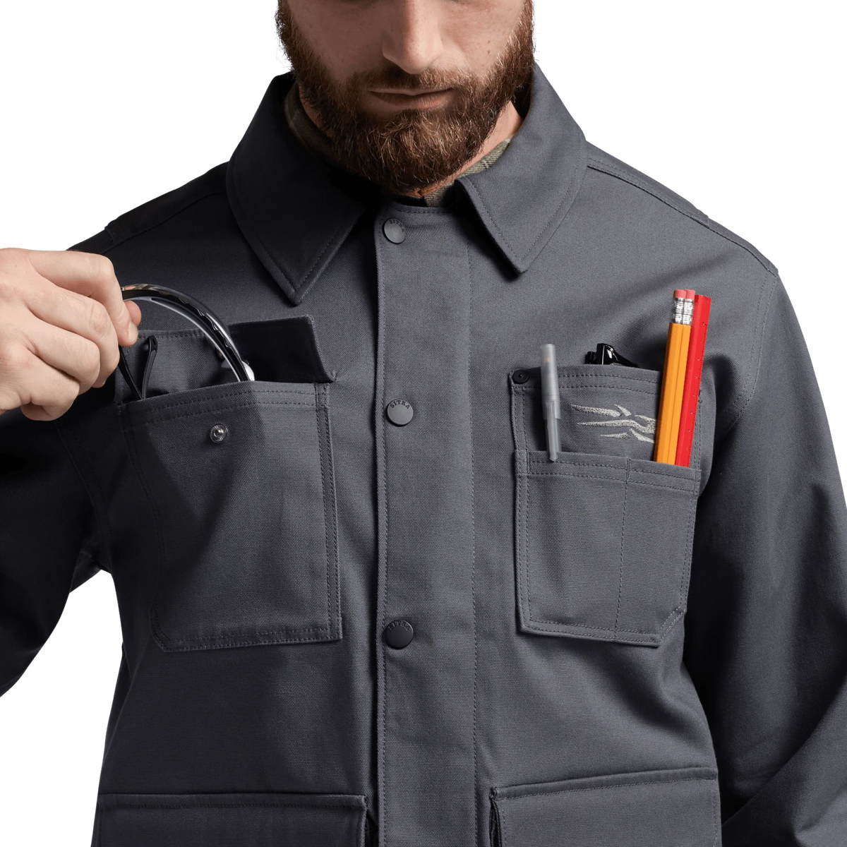 Iron grey chore coat with button front, pointed collar, and chest pocket