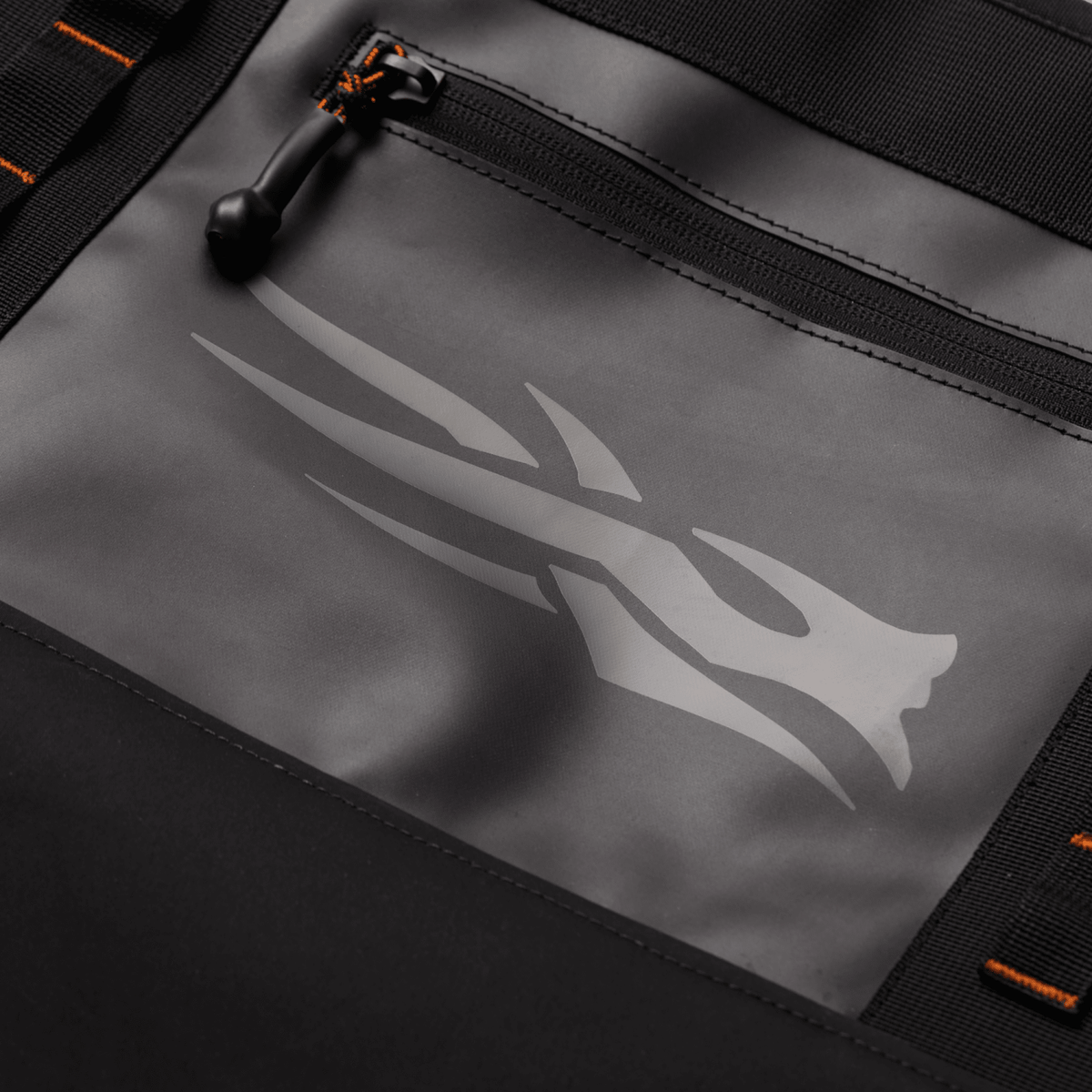 Tote bag interior pocket with zipper, storage label, and logo print
