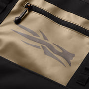 Tan tote bag interior pocket with zipper and logo graphic