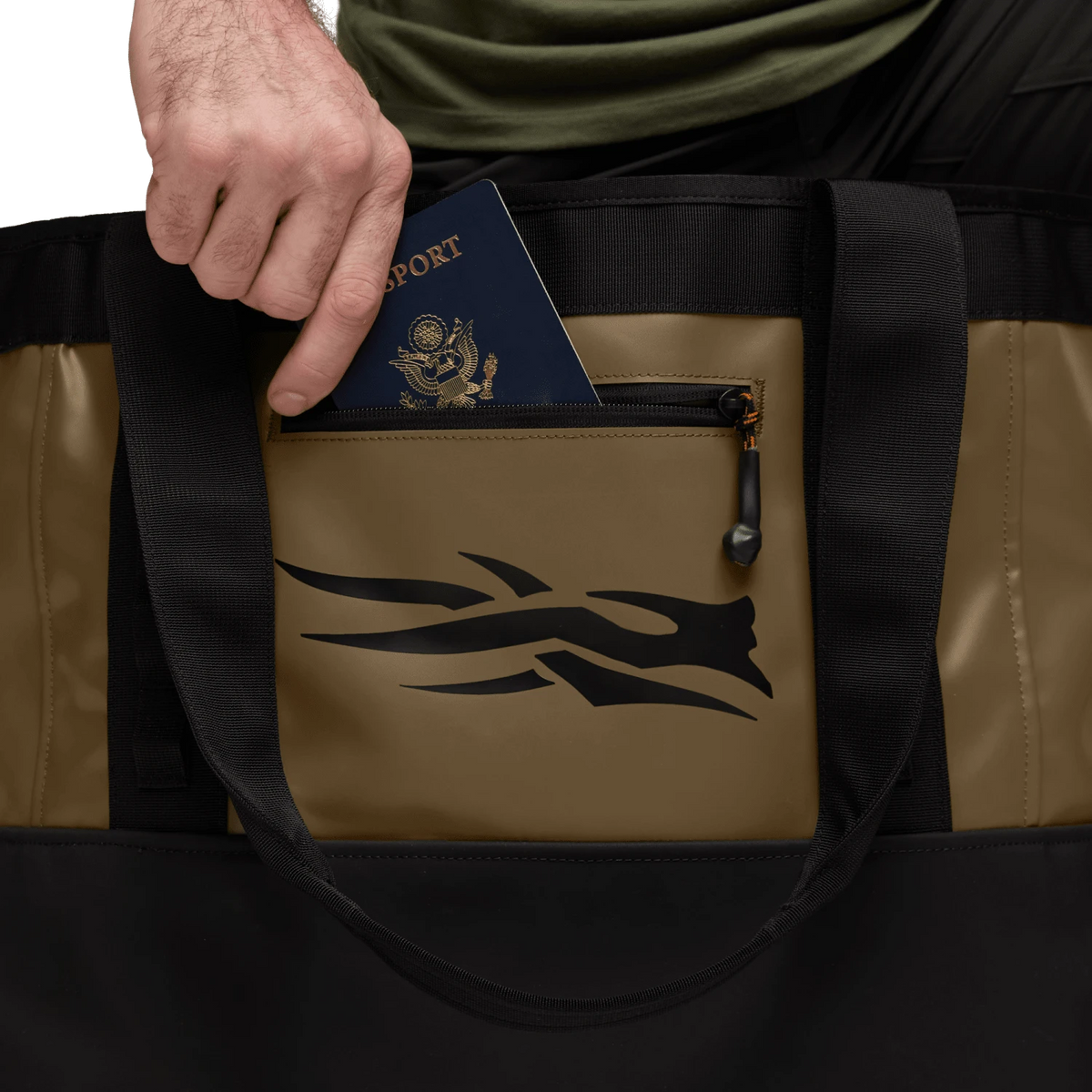 Black 40L tote bag with tan front panel, zipper pocket, and logo graphic