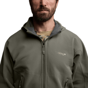 Olive fleece hooded jacket close-up with zipper track and chest logo