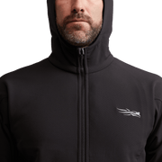 Black fleece hooded jacket, full-zip front with chest logo, close-up