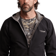 Black hooded zip fleece jacket with chest logo and high collar