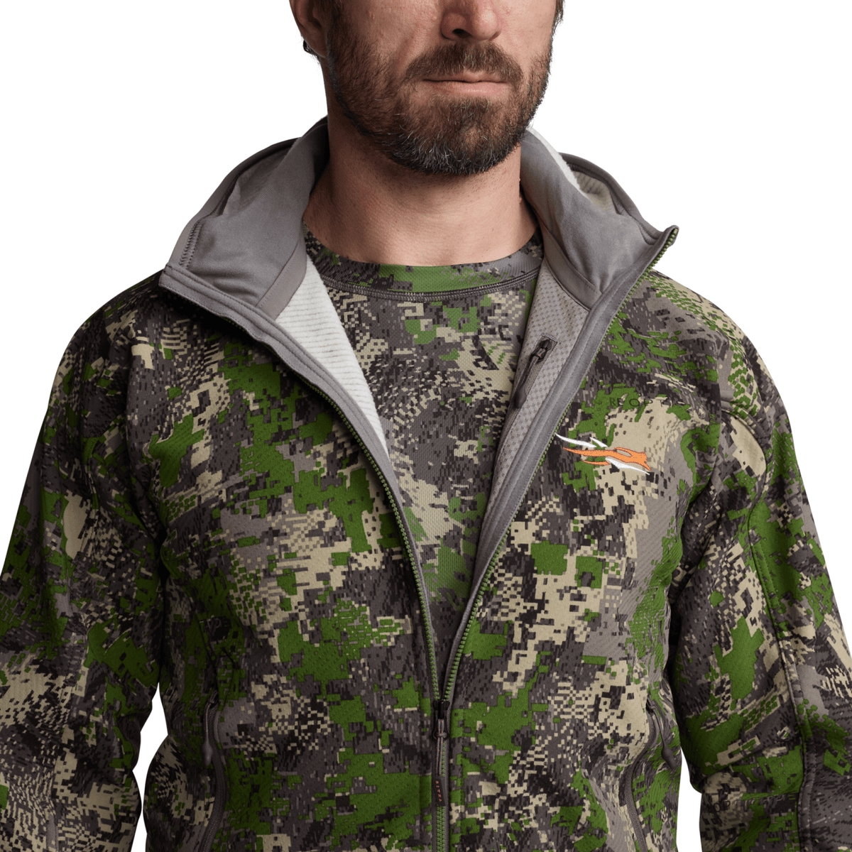 Green camouflage fleece jacket, partial zipper and chest logo, close-up