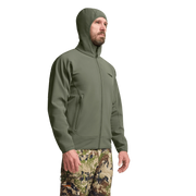 Olive fleece hooded jacket on model, showing side profile with zippered hand pockets.