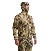 Alpha fleece hooded jacket worn by model, camouflage print, full-zip, hood and cuffs