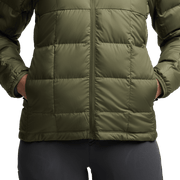 Olive green microdown hooded jacket front panel with horizontal quilting and zipper.