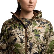 Camouflage hooded microdown jacket close-up with full-zip and high collar.