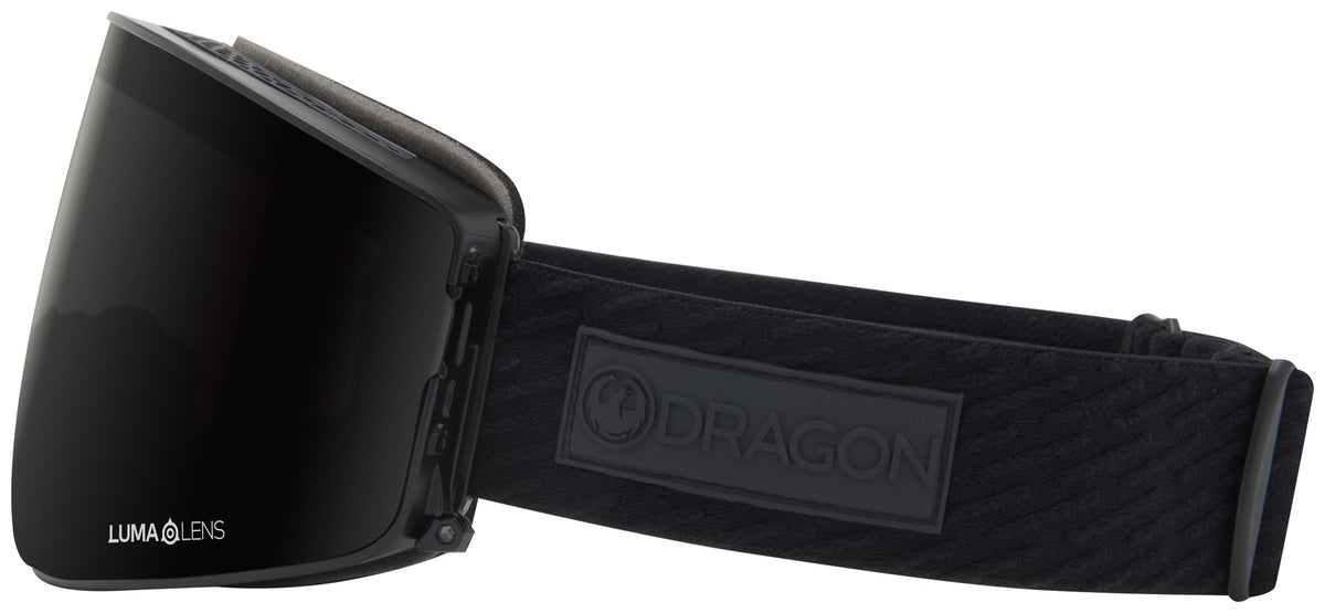 Black snow goggles with LUMA lens and textured black strap featuring the DRAGON badge.