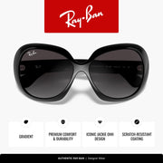 Black sunglasses with rounded lenses, sculpted bridge, and thick frames