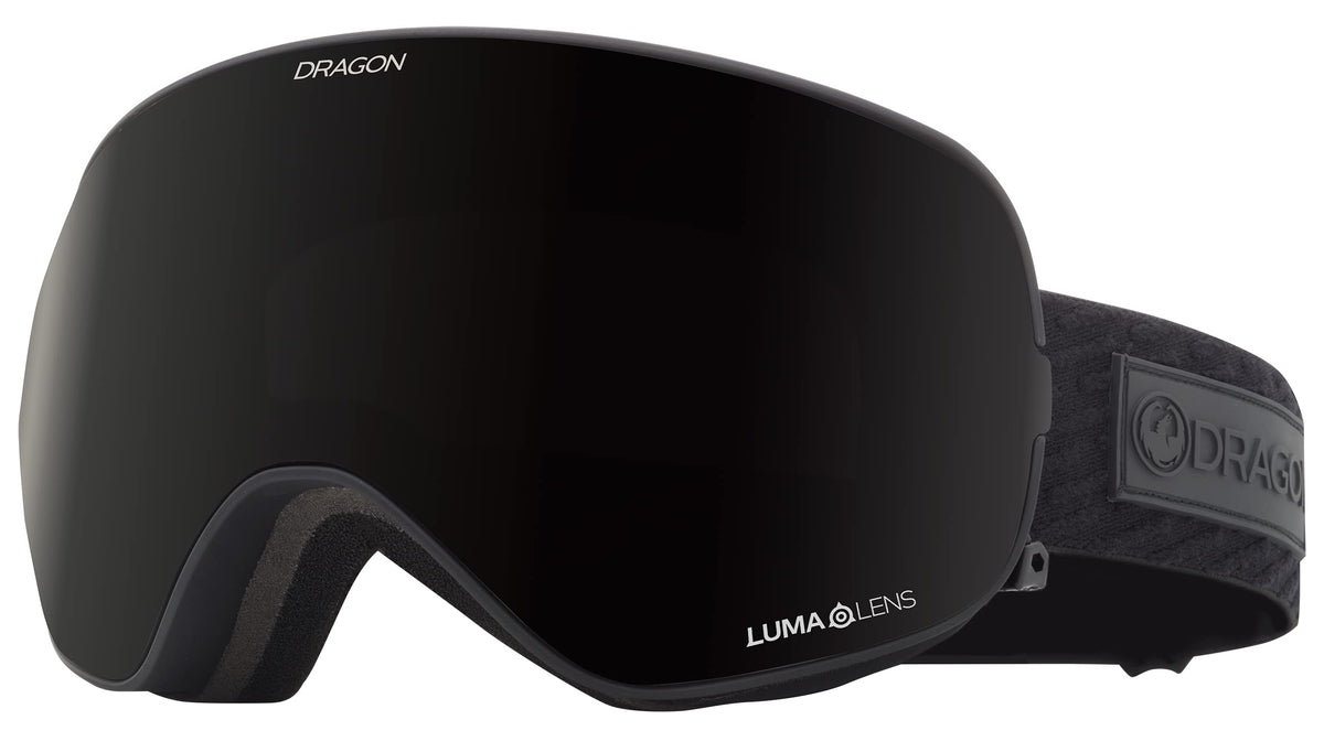 Black snow goggles with dark lens and DRAGON logo strap, curved low-profile frame