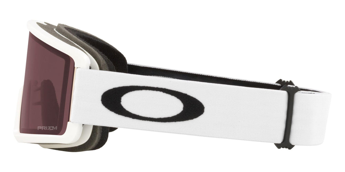 Snow goggles with white strap over black frame, dark mirrored lens