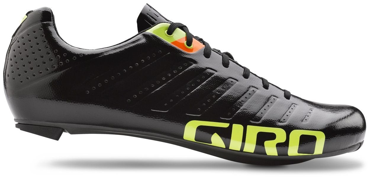 Black cycling shoe with lime and orange accents, perforated toe and Giro logo