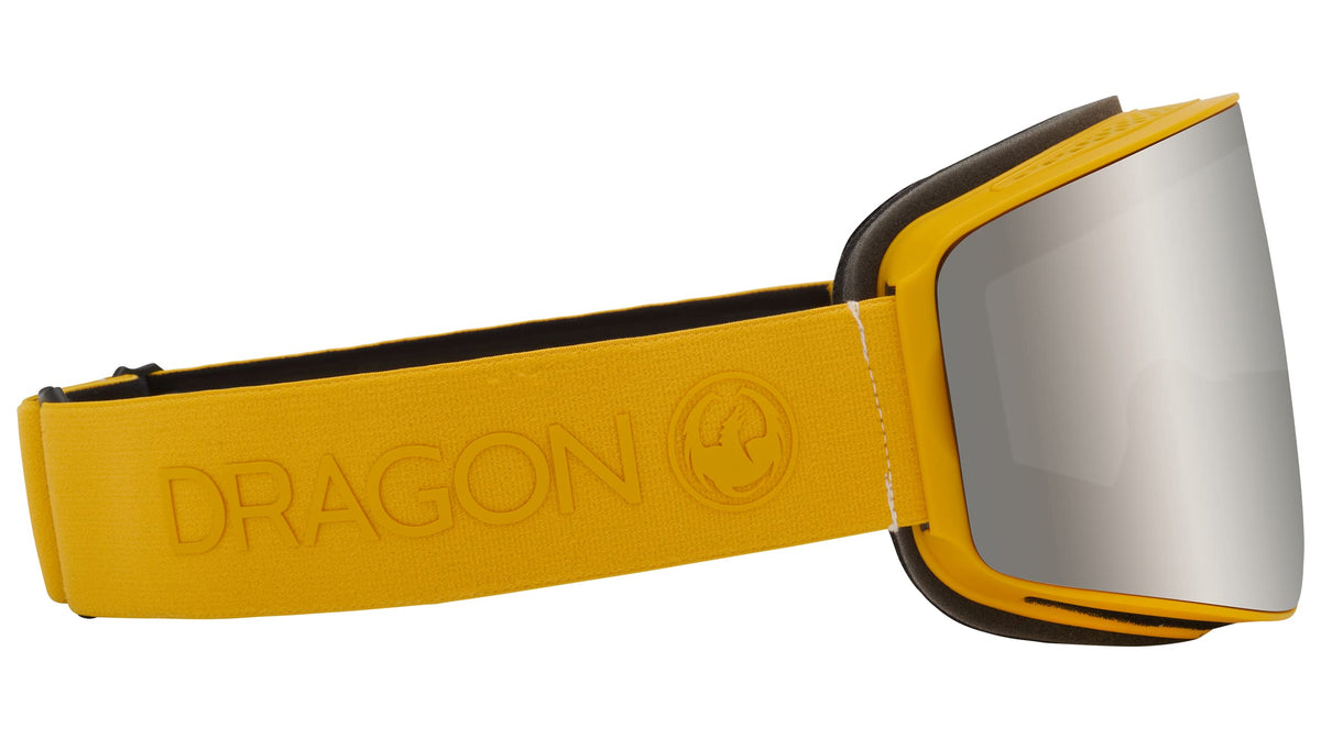 Snow goggles with yellow strap and wide gray lens, front view with DRAGON emboss