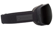 Black snow goggles with dark lens, padded strap and DRAGON logo badge at center