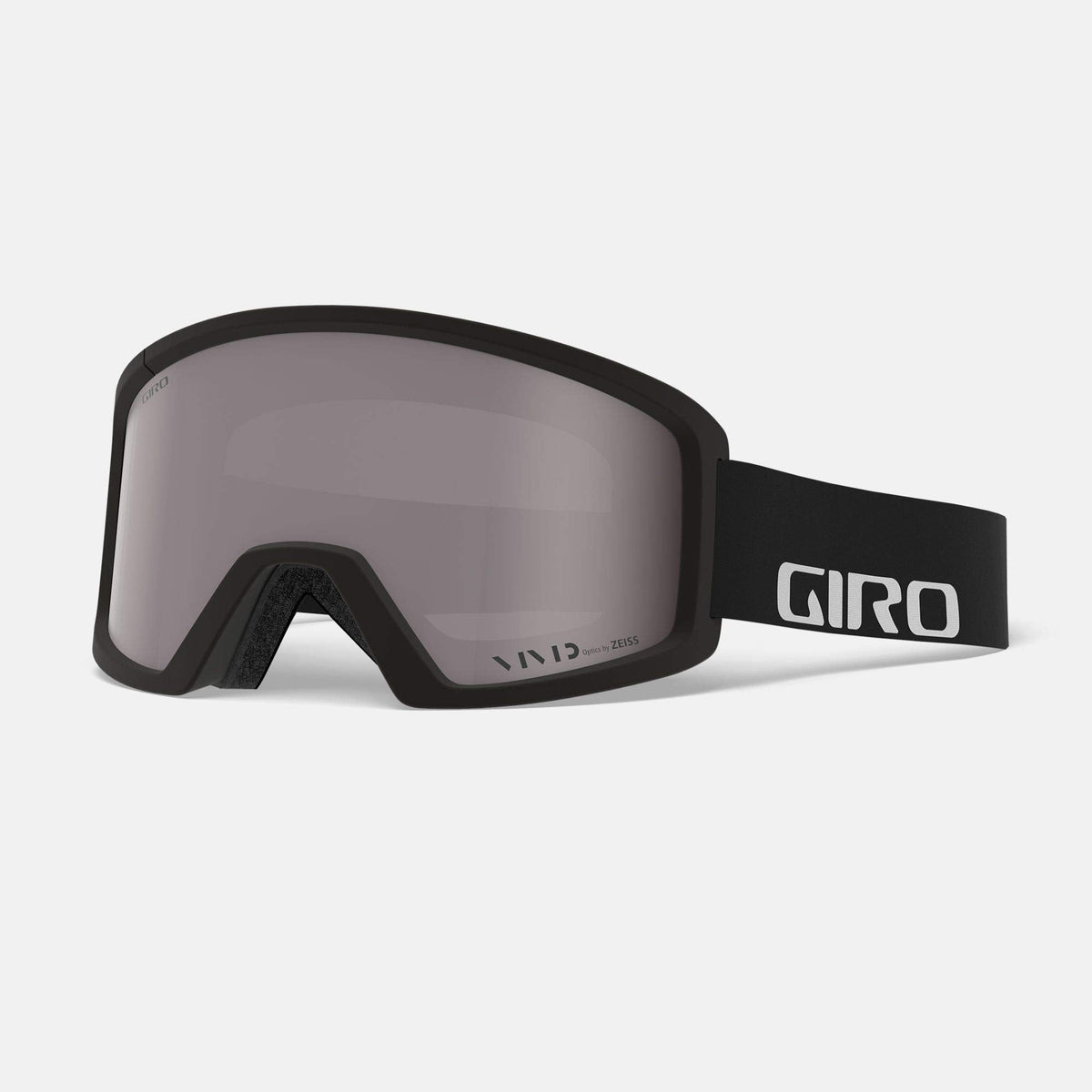Snow goggles with black frame and dark smoke lens; black strap with white logo.