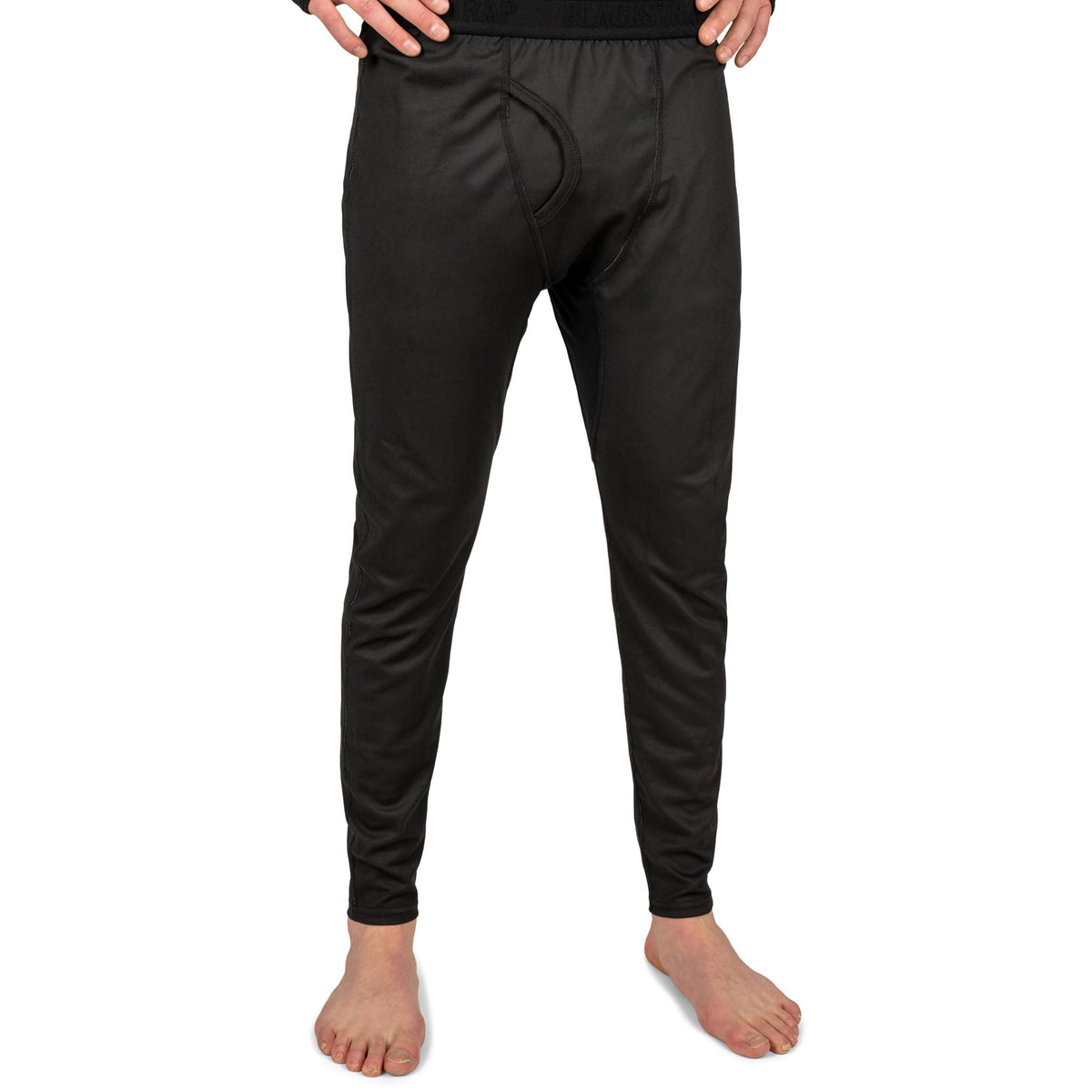 Black baselayer pants, side view, full length with ankle cuffs
