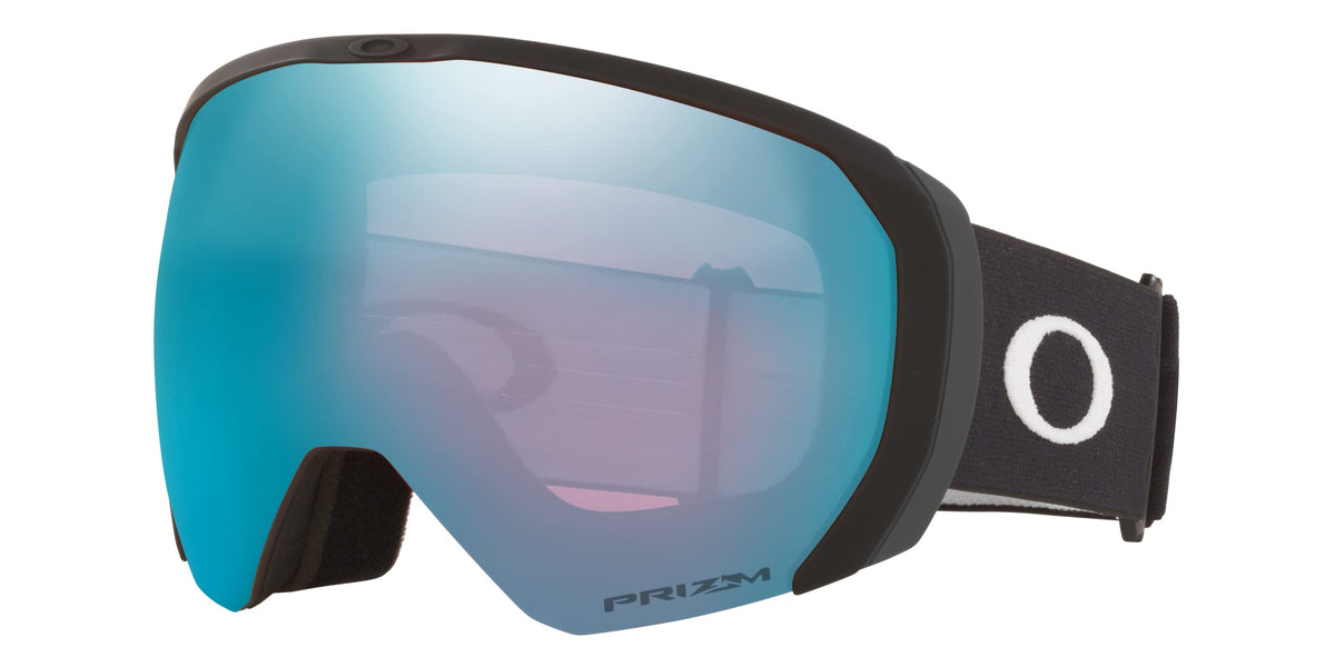 Large snow goggles with warm grey frame, black strap, and blue mirrored lens